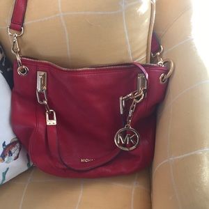 Red Michael Kors leather handbag